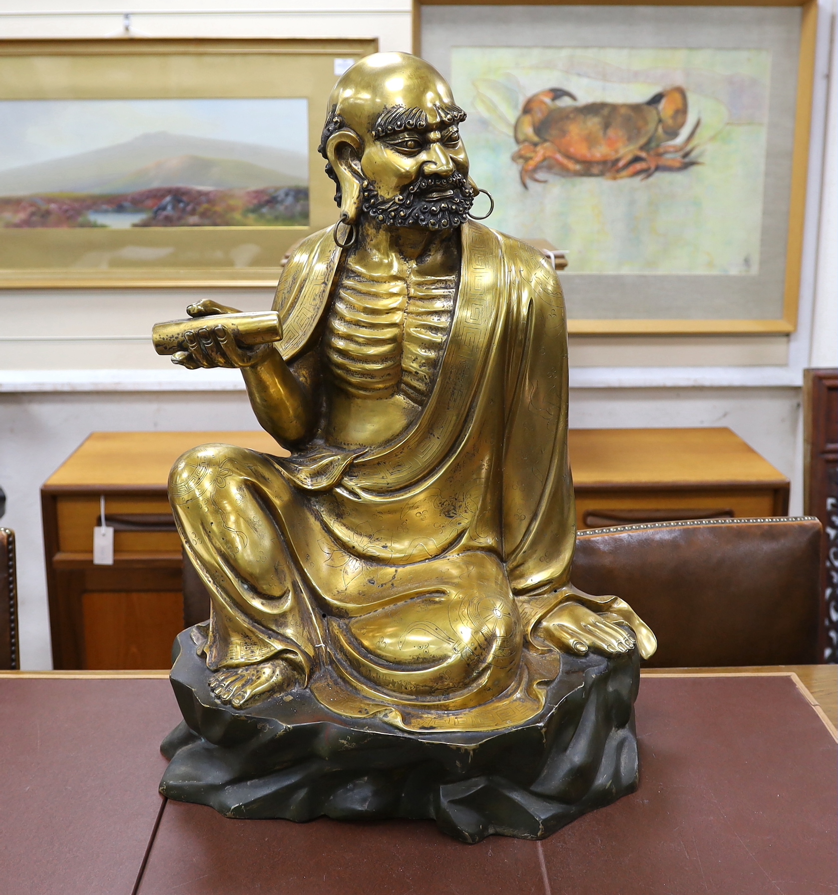 A large Chinese bronze seated figure of a Luohan, 20th century, height 72cm.
